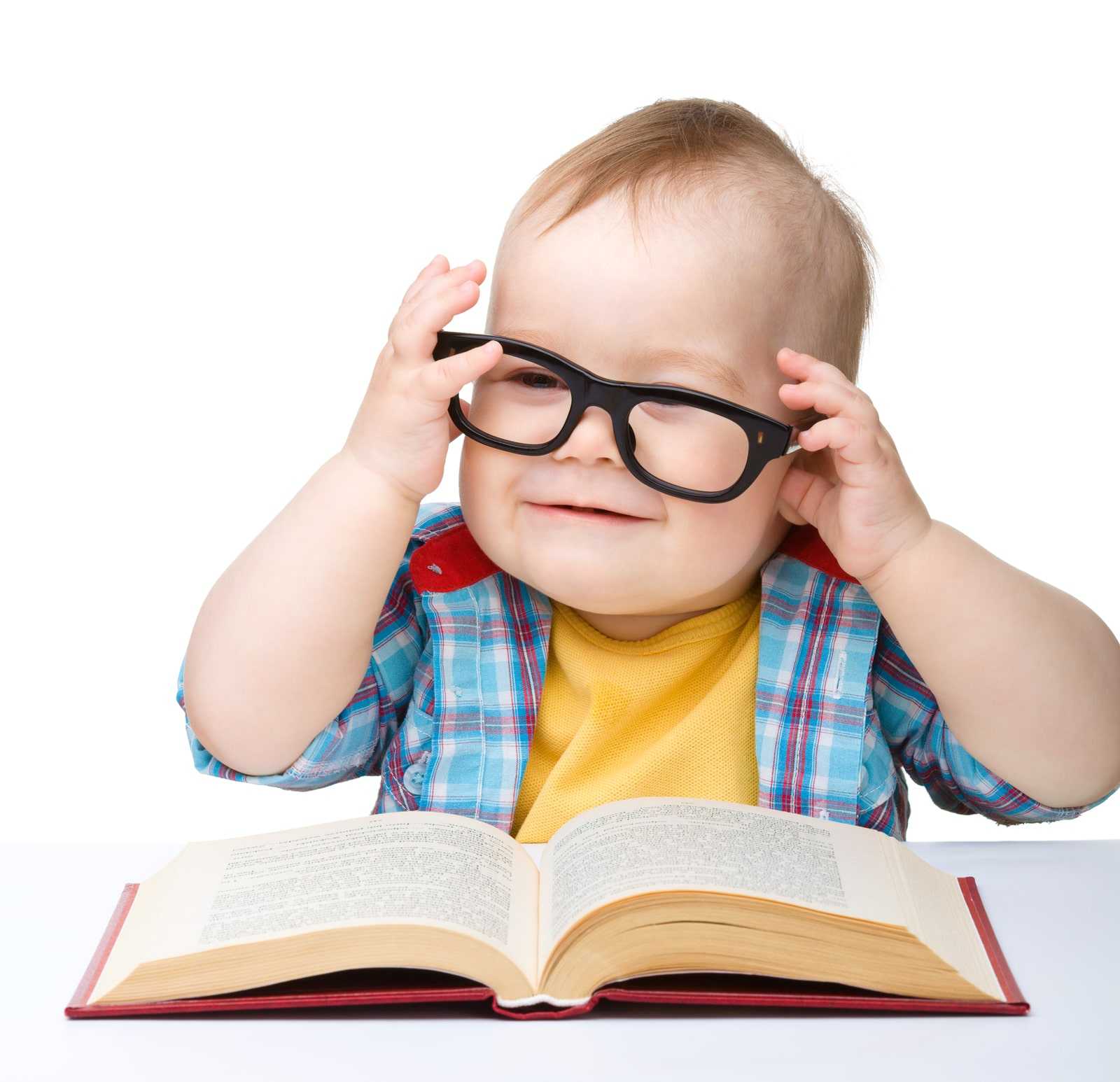 Little Child Play With Book And Glasses